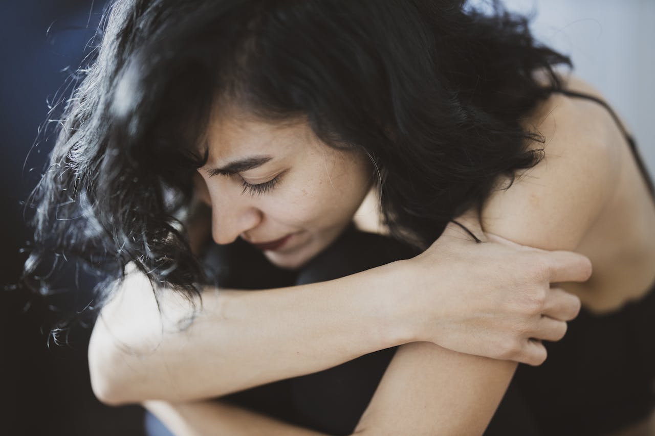 Woman Wearing Black Camisole