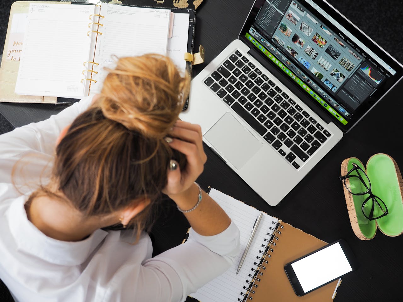 Teen with anxiety Sitting in Front of Macbook